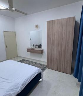 Nizwa Apartment | الذهب الأزرق للشقق الفندقية فرق