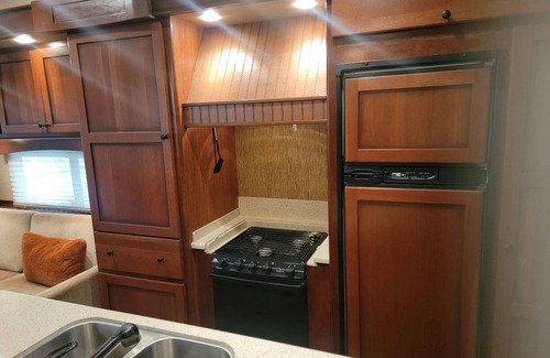 Tia Juana House | 1 mile East of Disney, safe fenced property, lots of room for trailers and rigs!