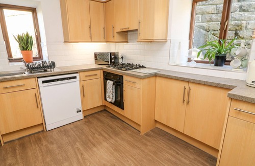Carnforth Cottage | 1 NETHERBECK BARN, pet friendly, with a garden in Carnforth