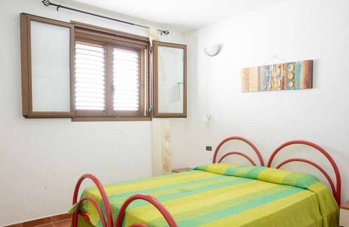 Torre di Bari Apartment | 1 two-room apartment to the sea, with veranda, sun umbrella and outdoor furniture