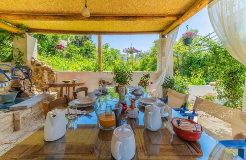 Panormos Apartment | 100m. away from the beach with large, impressive verandas and a majestic garden