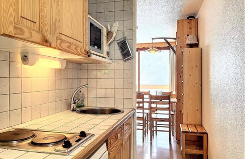 Le Corbier Apartment | 100m from ski slopes, 12nd floor, view ski slopes, swimming pool, balcony, tv, ski locker, 22m²