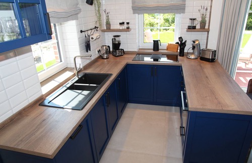 Eilsum House | 100qm Luxus-ferienhaus für 7 Personen Direkt am Wasser bei Greetsiel!