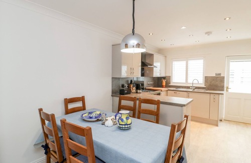 Seaton Cottage | 14 LYME MEWS, pet friendly, with a garden in Seaton, Devon