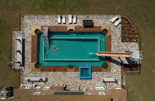 Groveland House | 15 Bedrooms On 10 Private Acres w/Enormous Pool, Lazy River, & FAST Waterslide!