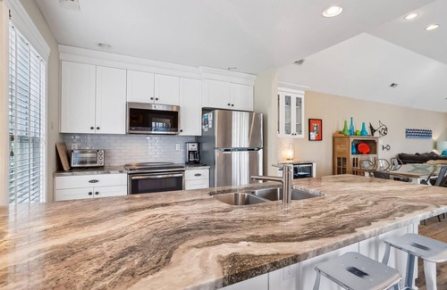 Buck Island Apartment | 1606 - Shades of Sand, a spacious 4-bed 4.5-bath Corolla, NC, hot tub, perfect for up to 9 guests.