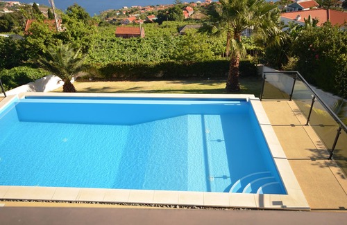 Estreito da Calheta Villa | 17 ° West, Lux. Inf. Pool villa, 5 minutes to the sandy beach, WiFi
