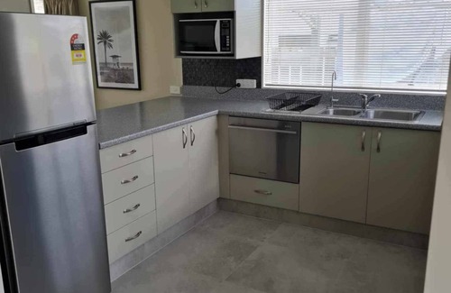 Mount Maunganui House | 19th Hole - Eat, Sleep, Golf