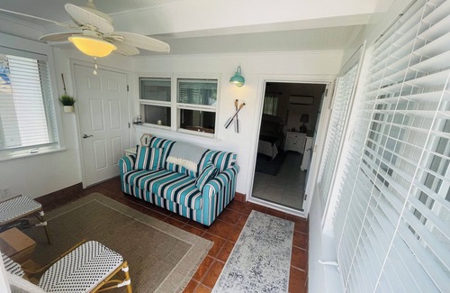 Emerald Isle House | 1BR beach getaway: pool, pier, sunset views. Full amenities. Near beach access.