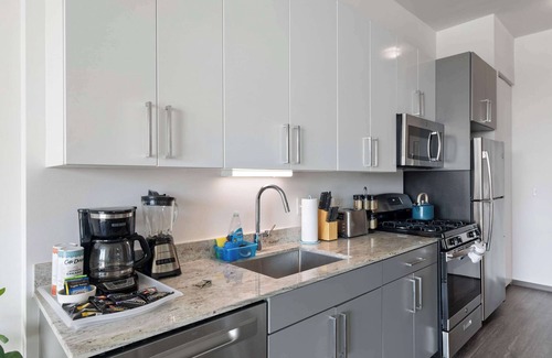 Palmer Square Apartment | 1BR City Loft With Modern Glass Views