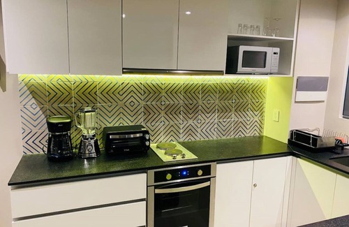 Ejidal Apartment | 1st floor 1 bedroom w sunny Patio and plants, Wifi, Rooftop pool, gym, 24h sec