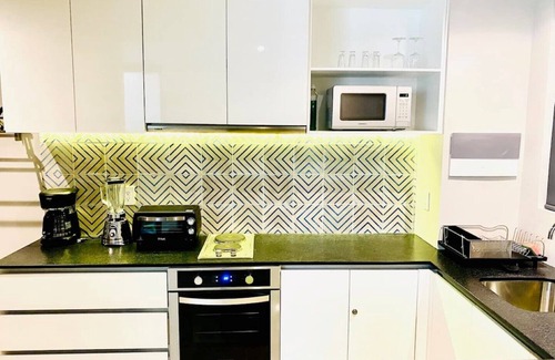 Ejidal Apartment | 1st floor 1 bedroom w sunny Patio and plants, Wifi, Rooftop pool, gym, 24h sec