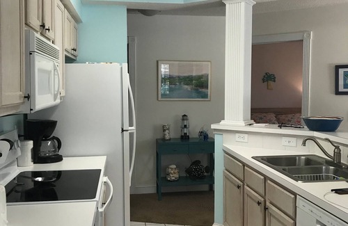 Sunset Beach Condo | 1st floor 2 BR, 2 BA Condo close to Beach & Golf Courses w/Indoor/Outdoor pools