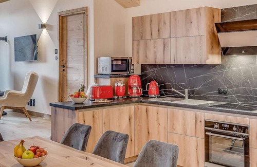 Champagny-en-Vanoise Apartment | 1st floor, swimming pool, sauna, balcony, fireplace or stove, parking, tv, ski locker, 83m²