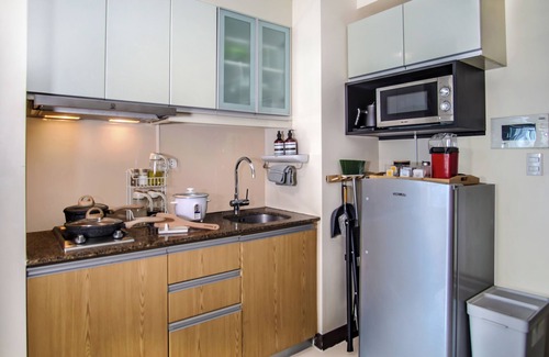 Forbes Park Apartment | 1Up Mario Retreat with Private Cinema and Game Console