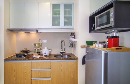 Forbes Park Apartment | 1Up Mario Retreat with Private Cinema and Game Console