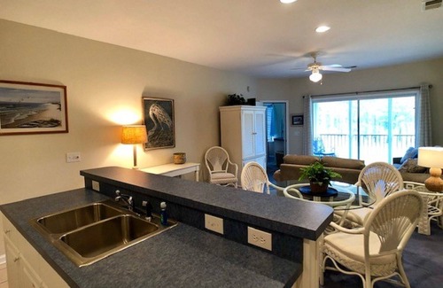 Sea Trail Condo | 2 BDRM Sunset Beach Condo: Screened Patio with view of Jones/Byrd 10th hole.
