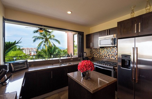 Conchas Chinas Condo | 2 Bed 2 Bath Partial Ocean View Corner Suite · R104