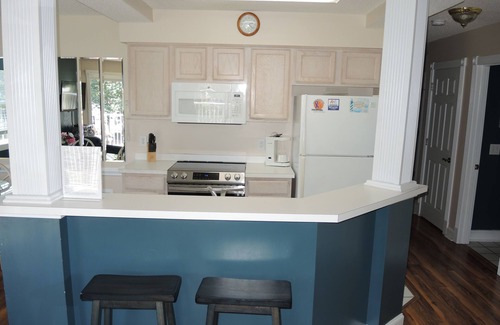 Calabash Villa | 2 Bedroom/ 2 Bath Condo within walking distance to food, golf, and the Pool!