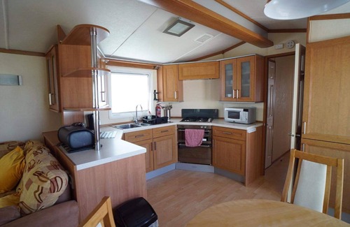 Heacham Ski Chalet | 2 bedroom caravan at heacham beach with decking