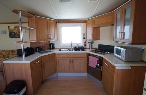 Heacham Ski Chalet | 2 bedroom caravan at heacham beach with decking