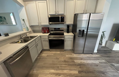 Southside House | 2-bedroom townhome in Bartram Park, full remote work set up. Pool, gym.