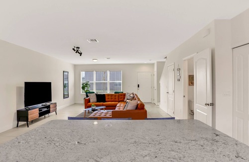 Buena Ventura Lakes House | 2-story home near Disney & Orlando with patio, fast WiFi, desk, washer/dryer, AC