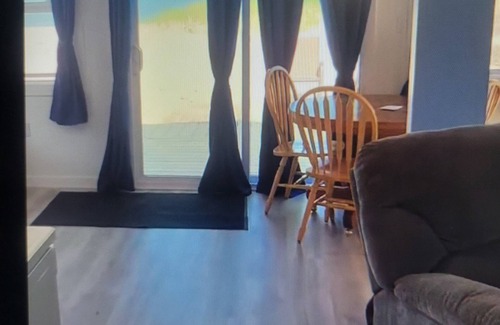 Oscoda Resort | #20 Thomas' Parkside Cottages. Walk-out to private deck/beach on Lake Huron