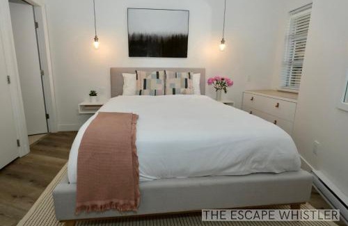 Village North Apartment | 2BR 2BA Whistler Escape with Newly Renovated Hot Tub, Steps from Olympic Rings Shops and Cafes