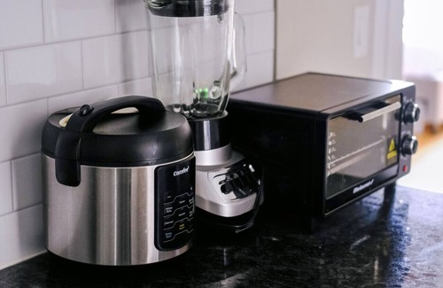 Irving Park East Apartment | 2BR Fitness Pad Private Gym Sleeps 7