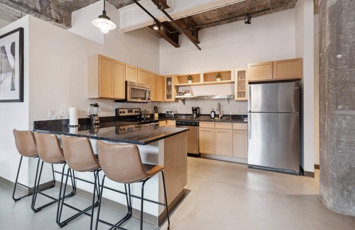 Strip District Apartment | 2BR Historic Loft Retreat With Pool & Gym