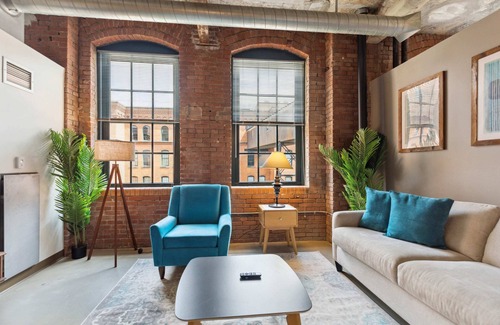 Strip District Apartment | 2BR Historic Loft Retreat With Pool & Gym