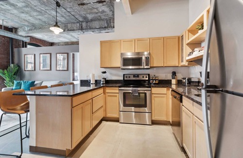 Strip District Apartment | 2BR Historic Loft Retreat With Pool & Gym