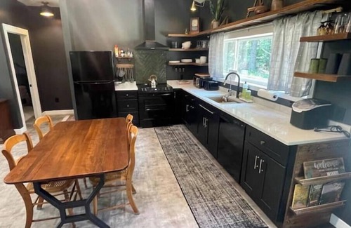 Wisconsin Dells House | 2BR Lakeside Cabin ✦ Hot Tub, Canoe/Kayak, Fire Pit Near Wisconsin Dells