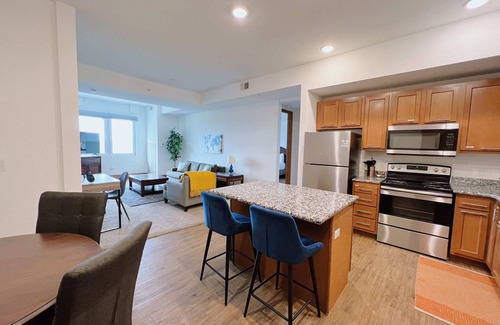 Grandville Apartment | 2BR Suite at The Grand Castle Pool, Gym & Parking