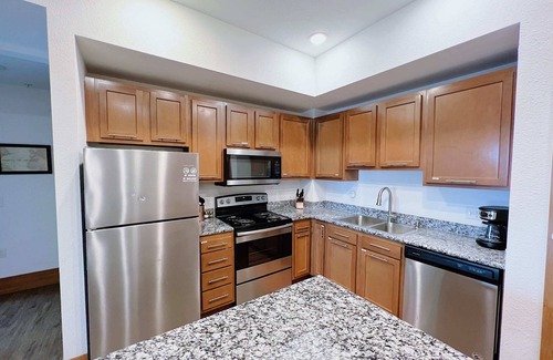Grandville Apartment | 2BR Suite at The Grand Castle Pool, Gym & Parking