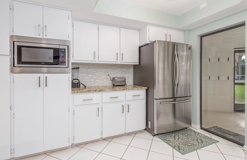 Pelican House | 3/2 updated Gulf access canal home electric heated pool & Jacuzzi - Coconut Cove