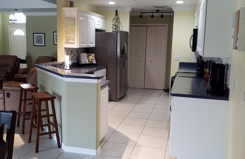 Englewood House | 3 bedroom 3 bath house with private heated screened pool on a quiet cul de sac