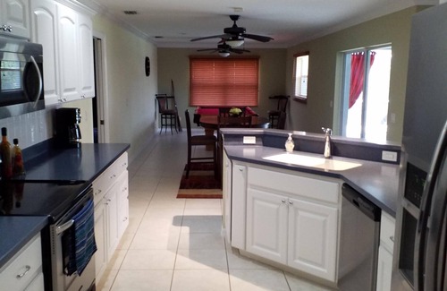 Englewood House | 3 bedroom 3 bath house with private heated screened pool on a quiet cul de sac