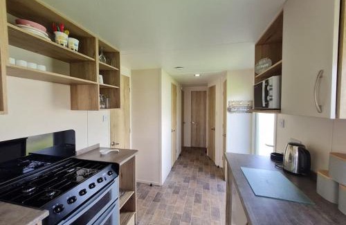 Exmouth House | 3 Bedroom Deluxe Caravan at Haven Devon Cliffs