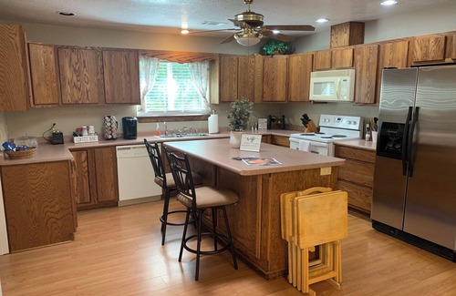 Northeast Heights House | 3 BR 2 BA Guest House with heated pool, hot tub, outdoor kitchen & putting range