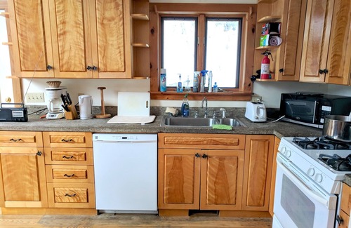 Cummington House | 3BR Riverfront Log Home with Steam Sauna, Soaring Glass Wall & Private Forest