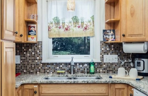 Commonwealth Park House | 4 bed/2 bath home with a 3-season sunroom with a variety of nice amenities