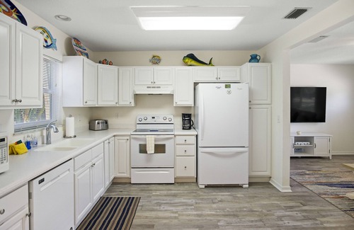 Clearwater Beach House | 4-Bed Coastal Retreat: Heated Pool, 200 Steps to Beach, Walk to Fun!
