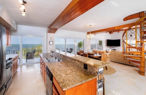 Sunrise Point House | 4 Bedroom Key Largo Oceanfront Home ~ Pool, Hot Tub, Dockage, Cabana & Fire Pit