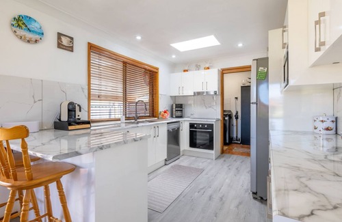 Salamander Bay House | 4 Gilchrist Rd - pet friendly, air con, Wi-Fi
