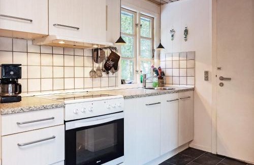 Ho House | 4 person holiday home in Oksbøl