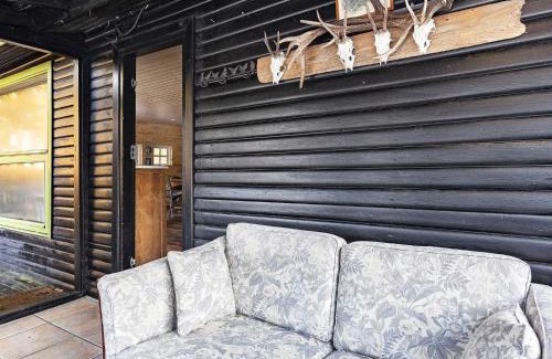 Ho House | 4 person holiday home in Oksbøl