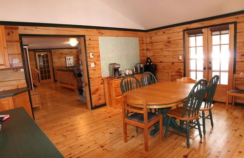 Algonquin Highlands Cottage | 4-Season Private Log Cottage on Kawagama Lake, fireplaces, sunroom, dock, Wifi
