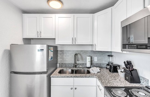 Treasure Island Apartment | 🌞400 ft to the Beach👙Onsite Heated Pool🐬Bungalows #8🌴Grills🐶Dogs Welcome!